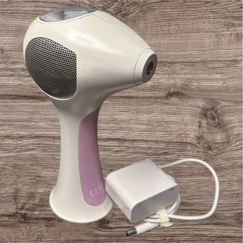 Tria White and Pink Hair Removal Device